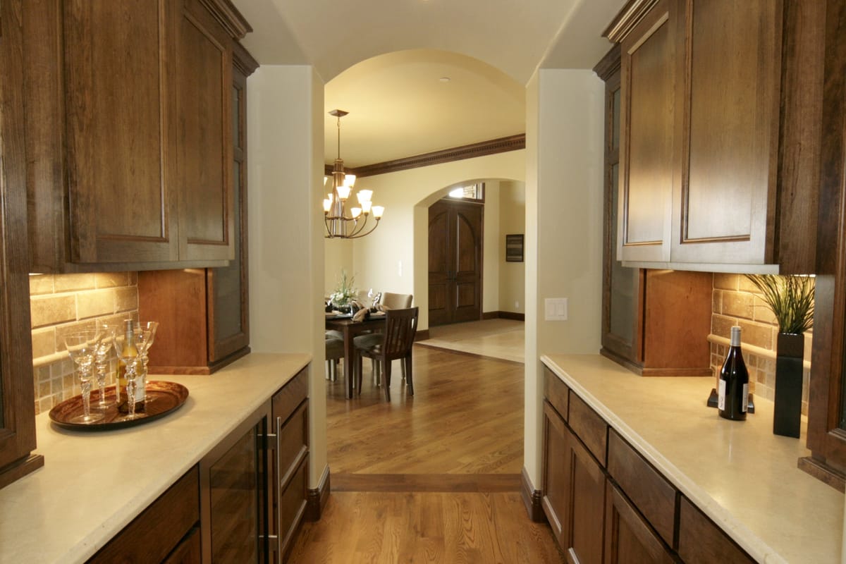 A butler's pantry looking through to the dining room