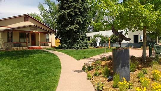 A landscaped path leading to a public building in Lafayette
