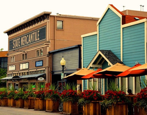 The State Mercantile building and outdoor cafe seating in downtown Louisville